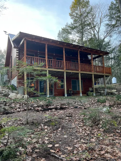 Desert Pond Log Cabin - Image 1