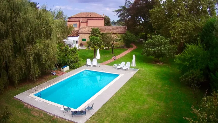 Secluded converted barn in large gardens with pool - Image 1