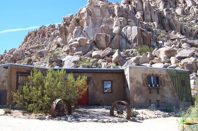 Nestled Up Against the Rocks - Image 1