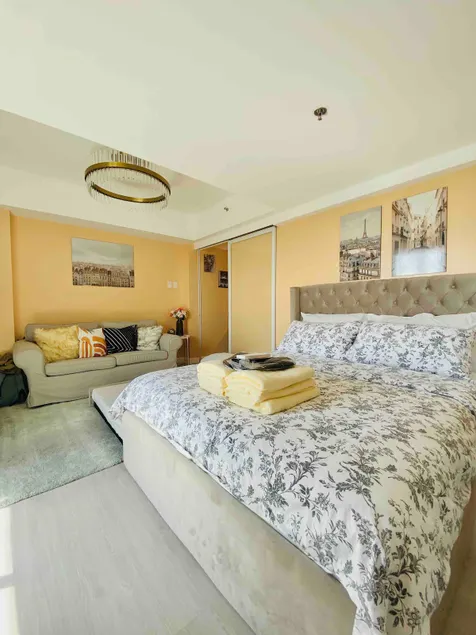 1BR-MonteCarloBliss by The Bali Corner at Azure North, 25th Floor, Full view of Beach Resort Amenities - Image 1