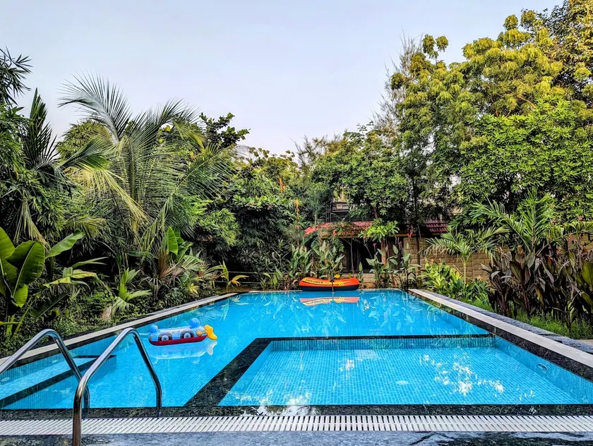 Nature’s Trail: Quiet 2BHK + Peaceful Pool Time - Image 1