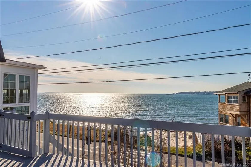 Desirable location w/direct water view, large deck - Image 1