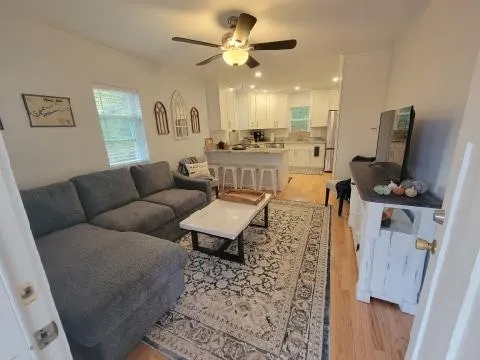 Centrally located, pristine, creekside home. - Image 1