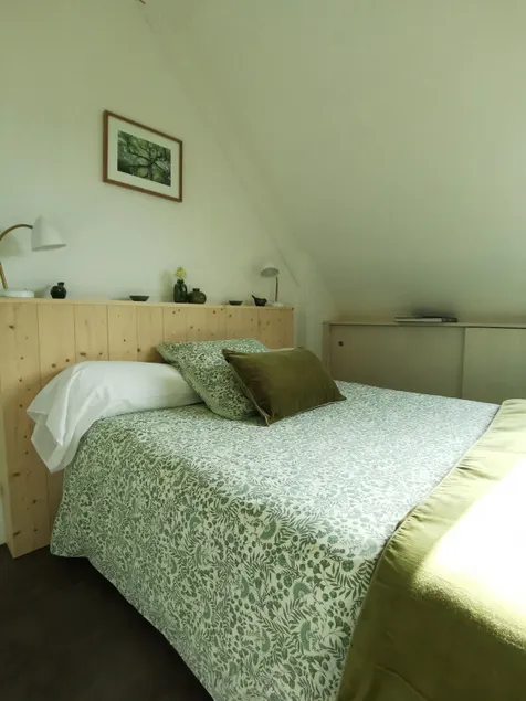 Bedroom on the second floor of a family home - Image 1