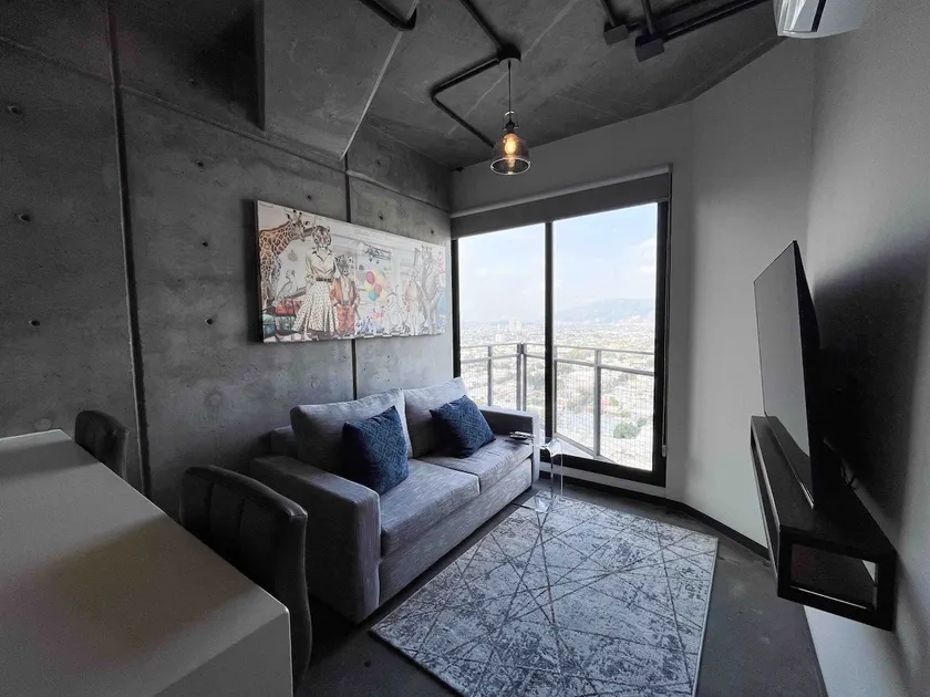 Modern apartment with a city view. - Image 1