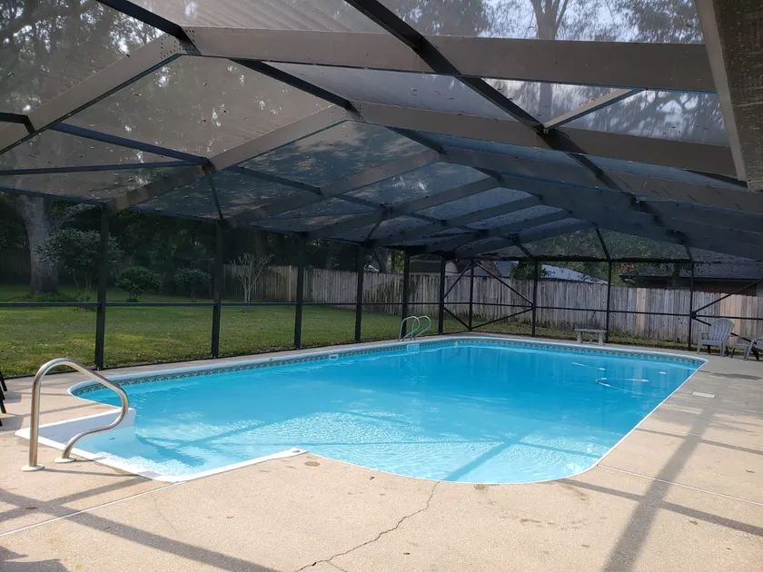 Private Getaway with Screened Pool, Upscale Kitchen, & Large Private Fenced Yard - Image 1