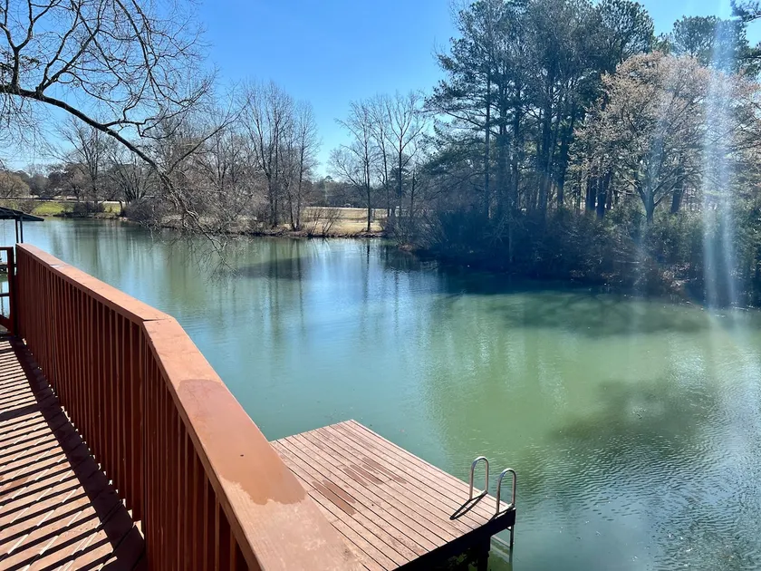 lake home with boat dock and private ramp - Image 1