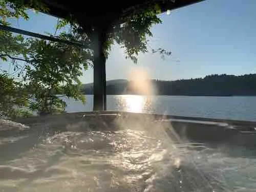 Sinclair House ~ Cozy Waterfront Retreat with Spa - Image 1