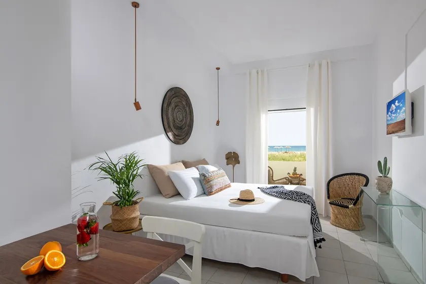 Stroll barefoot to the beach from a boho tiny home - Image 1