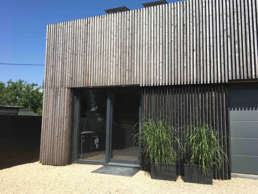 Larch clad architect designed contemporary annexe. - Image 1