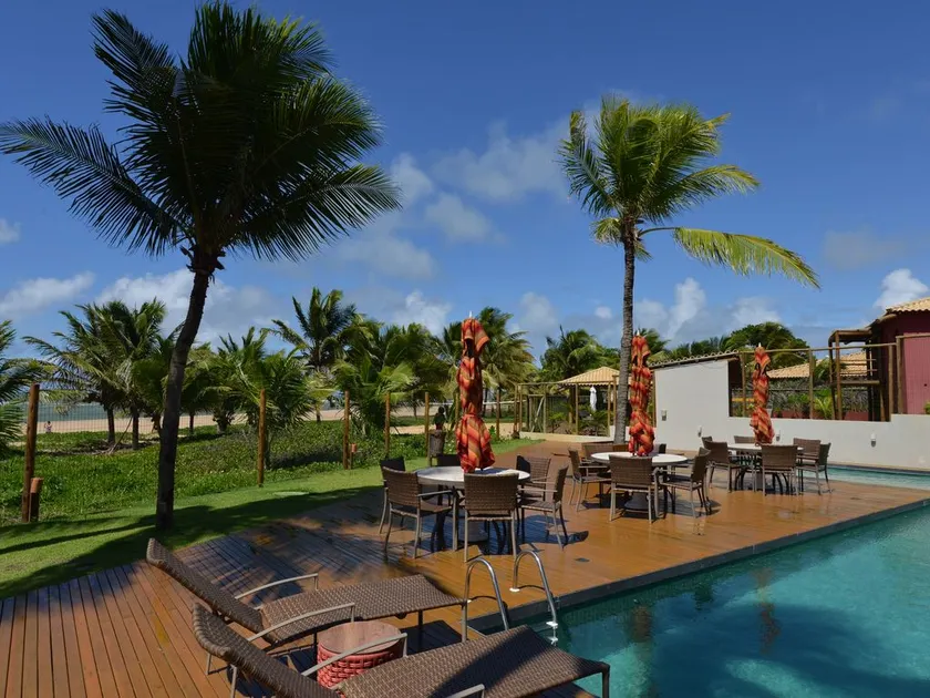 A village right on the sand near natural pools! - Image 1