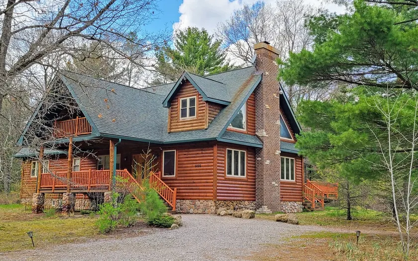 Luxury Family Cabin in a forest with a private pond - Image 1