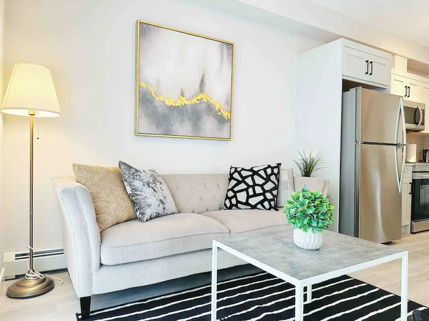 Brand new 2BR modern home near airport & shopping - Image 1