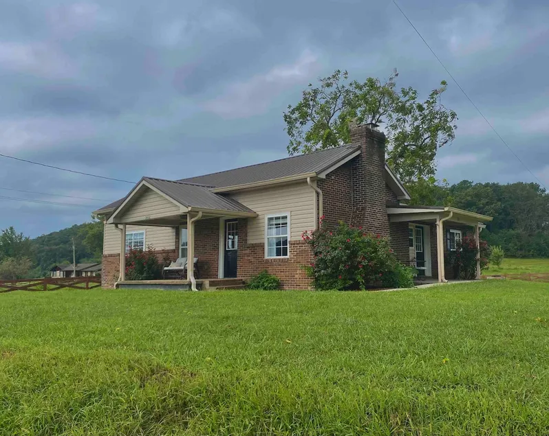 Brick Farmhouse Retreat – 7 Minutes to Red Clay State Park - Image 1