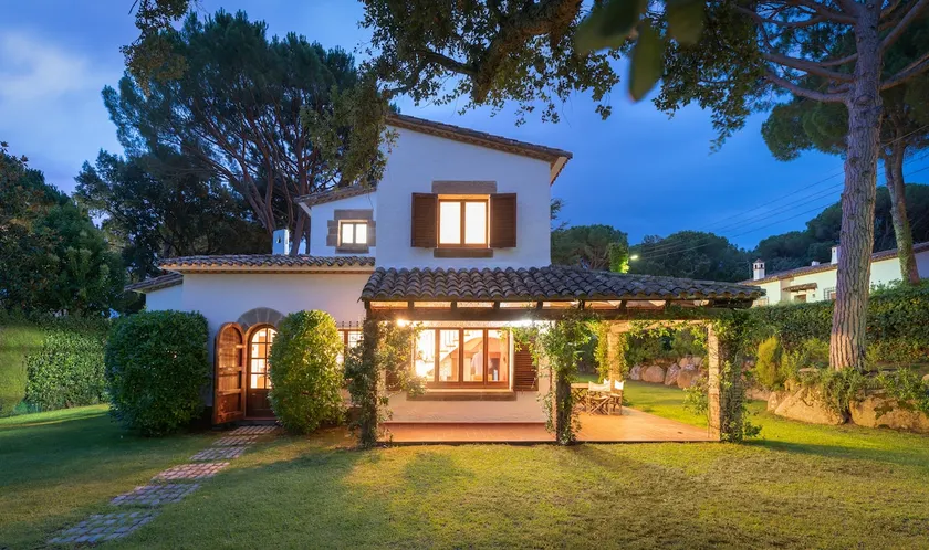 A villa with a large garden and a porch · Golf Costa Brava - Image 1