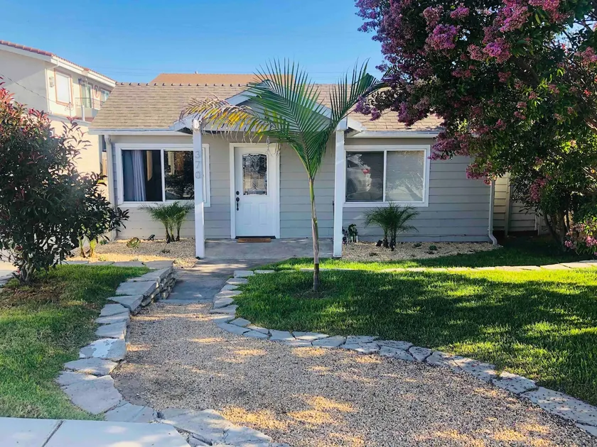 > **Remodeled Beach Bungalow** with Mid Mod Decor! - Image 1