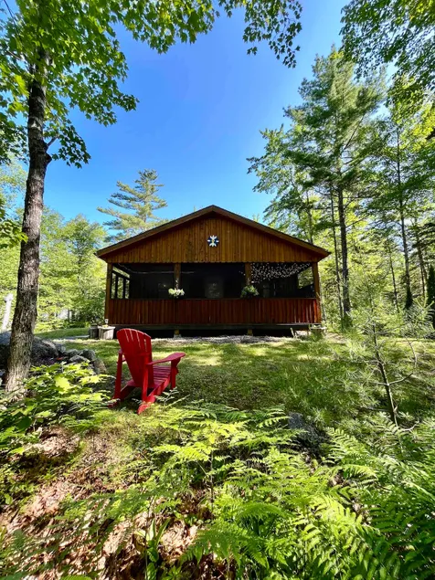 Falls Lake Burrow - Private Cottage with Screened-in Hot Tub - Image 1