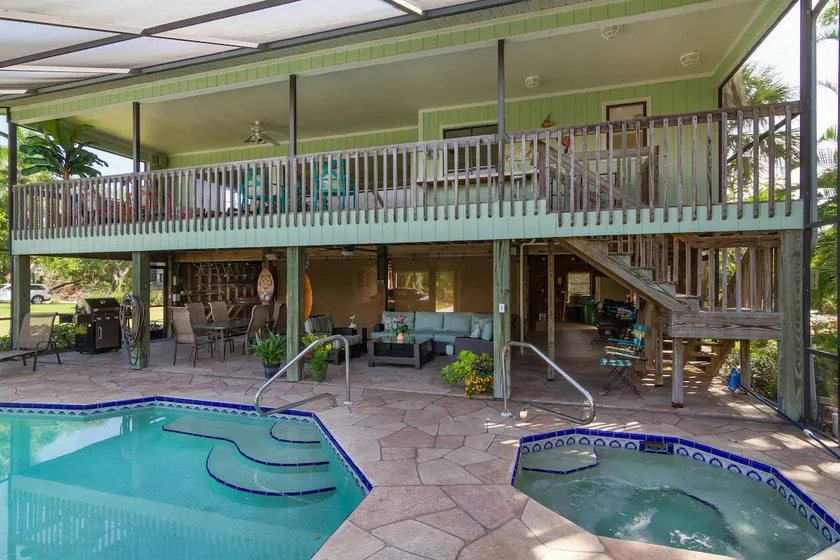 Gulf access, tropical river front. Heated pool/Spa - Image 1