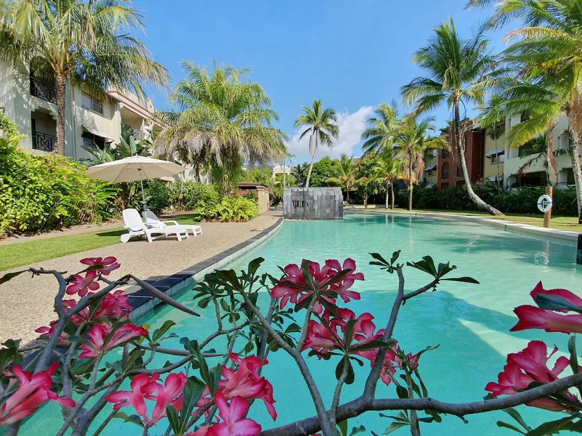 Tropical Retreat with 9 Pools Gym and BBQ Access - Image 1