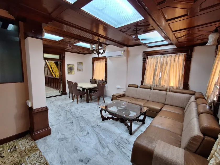 ”Saffron” Luxurious Teak Wood Themed Penthouse - Image 1