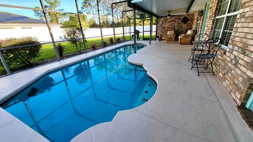 Mermaids Retreat 4/3 pool home spacious relaxation - Image 1