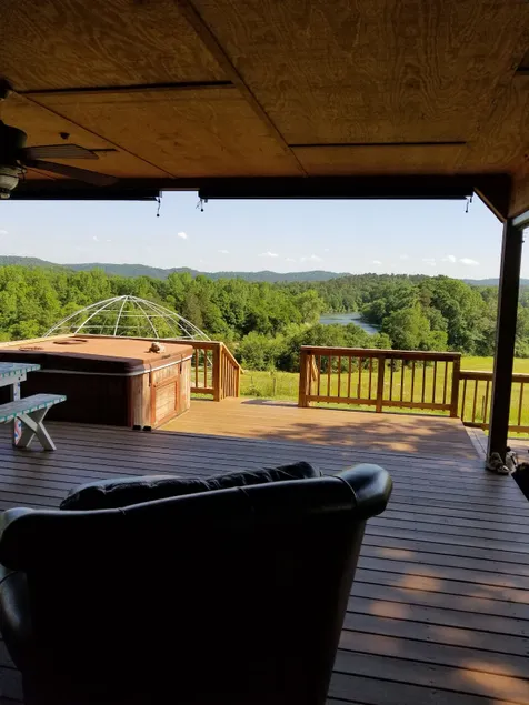 River Front Escape: Mountain View & Large Patio - Image 1