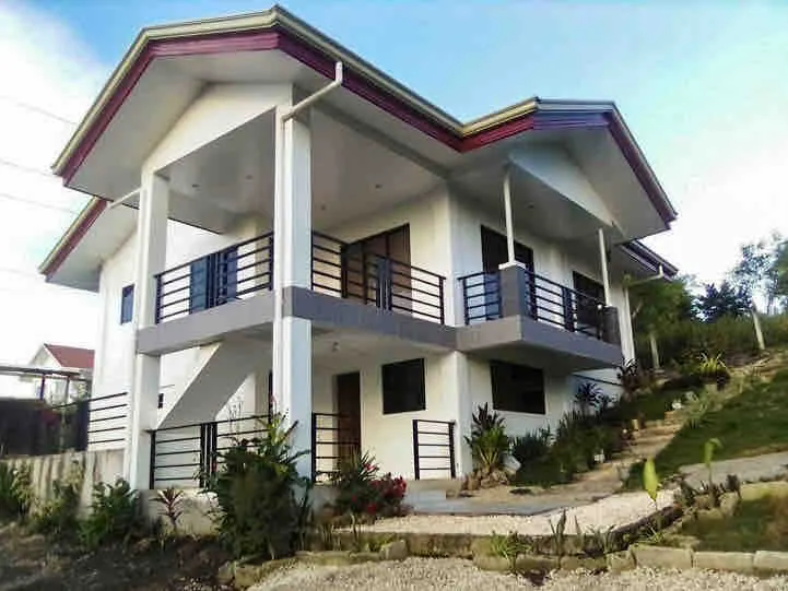 A modern tropical home surrounded by nature. - Image 1