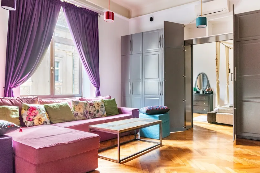 Chill in Front of the Home Theater System at a Colorful Pad - Image 1