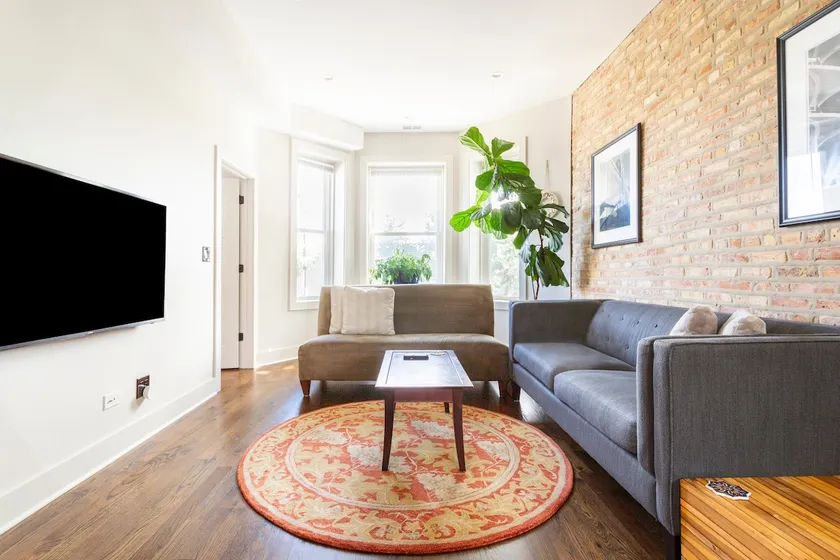 Soft Suede and Warm Bricks at a Stylish Rogers Park Home - Image 1