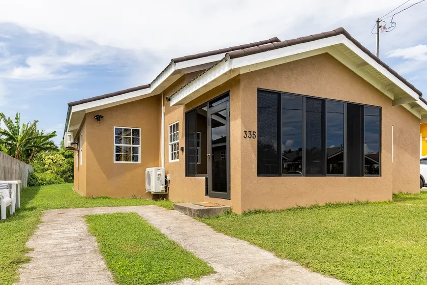 House of Amour is a stunning 3 bed 2 bath fully ac villa in Drax Hall CC St Ann - Image 1