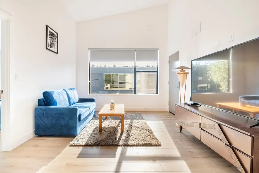Brand new modern condo with private backyard! - Image 1