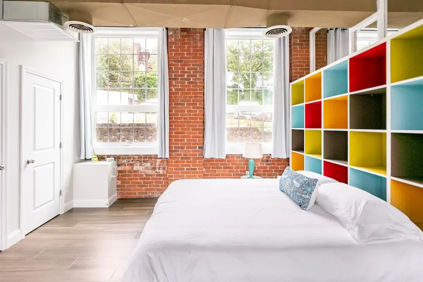 Jennifer's Historic Loft Glass Bedroom - Image 1