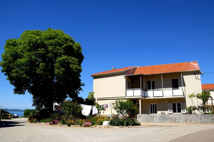 House surrounded with trees and gardens. - Image 1