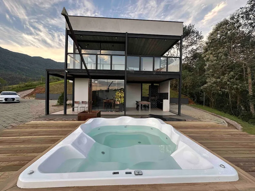 Mountain house with waterfall - Image 1
