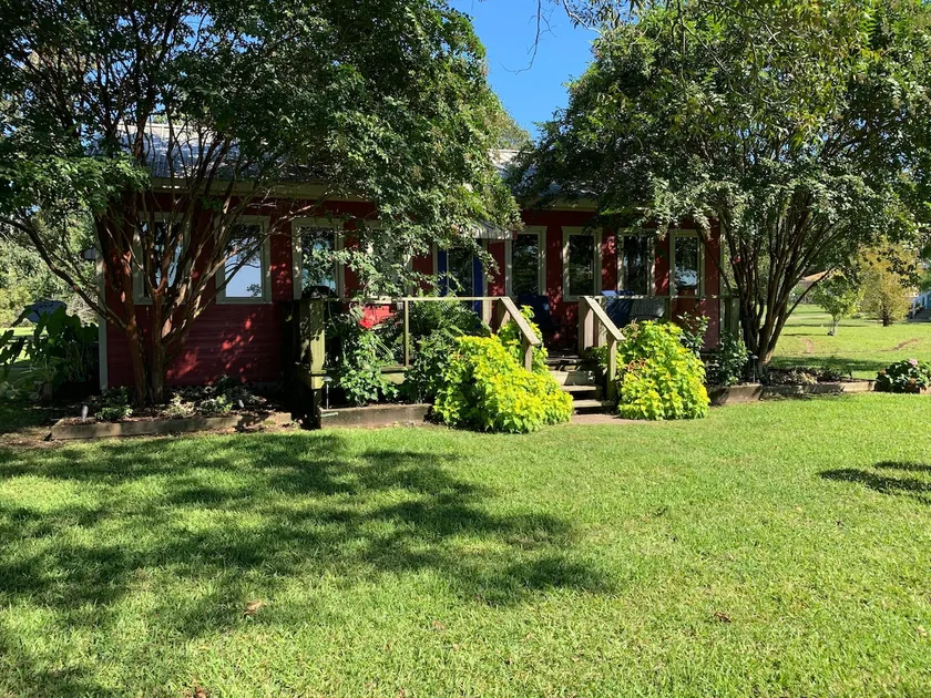 The Red House on Cross Lake - Image 1
