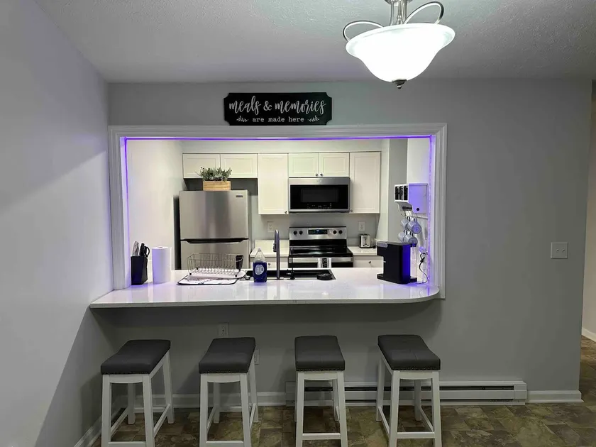 Cozy Cove! w/garage and small backyard - Image 1