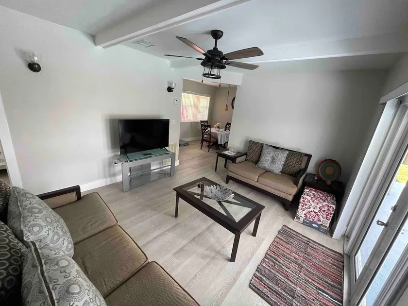 Quaint 3-bedroom home with a pool. - Image 1