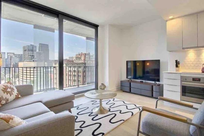 Quartier-des-Festivals Cozy Urban Retreat Pool+Gym - Image 1