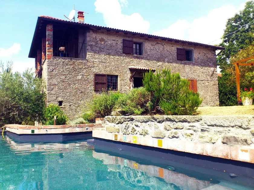 Casa Quintilio, onde elegância e rústico se misturam harmoniosamente - Image 1