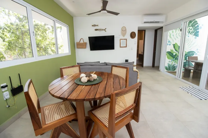Bright Modern 2BR at TAO | Pools, Gym, Fast WiFi - Image 1
