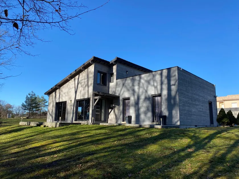 Family home with a wooden frame - Image 1