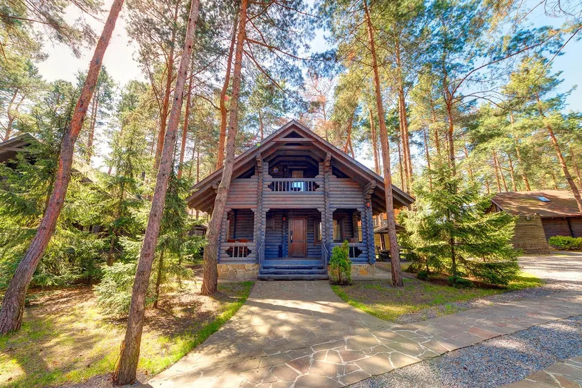 Two-storey chalet in a forest complex - Image 1