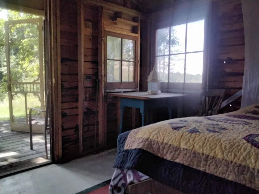 cozy cabin with outhouse - Image 1