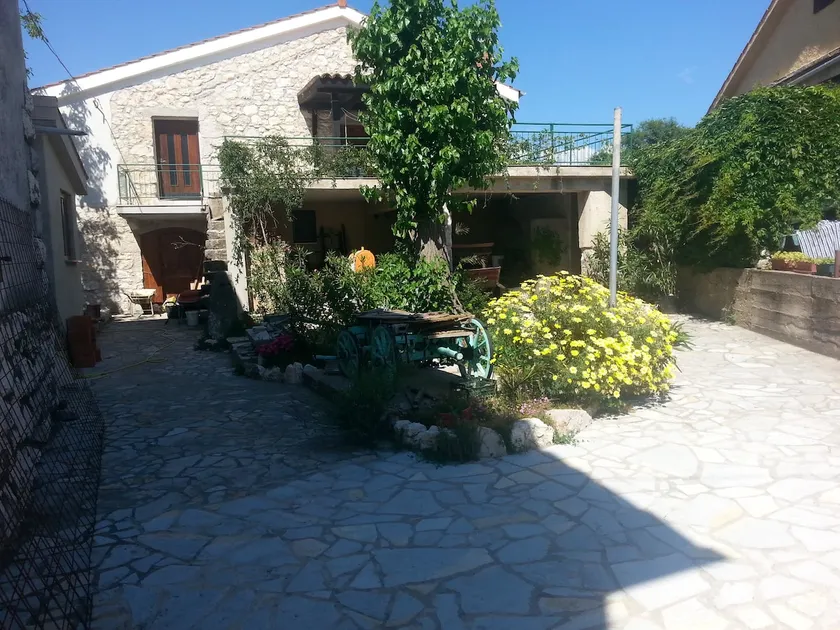 apartment in a Mediterranean stone house with a garden - Image 1
