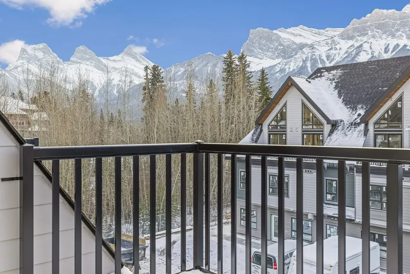 Explore the rockies from a stylish mountain condo - Image 1