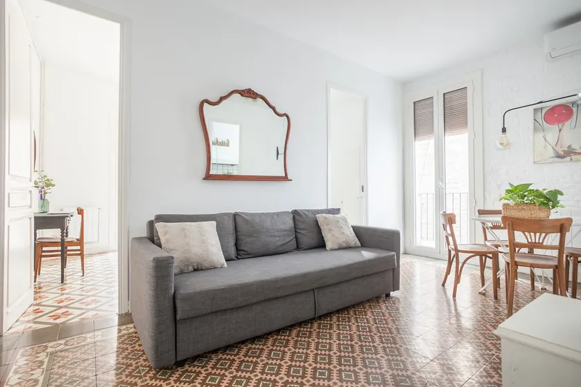 Surya BCN Apartment: Sun, relaxation, and Modernism. - Image 1