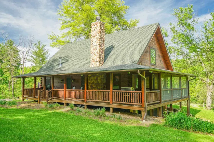 Log Cabin on private 66 acres! - Image 1