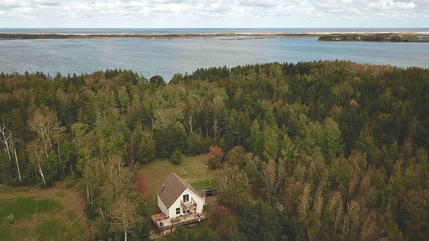Nestled Woods by Brackley Beach - Image 1