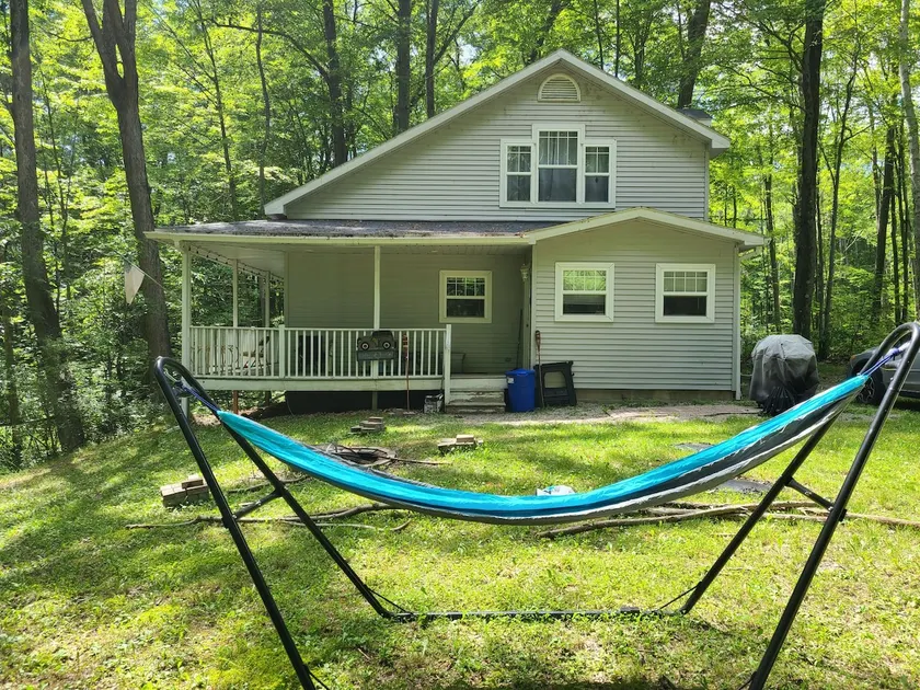 Cheerful 3-bedroom, 2 full-bath cottage with DNR launch lake access on Chippewa Lake. - Image 1