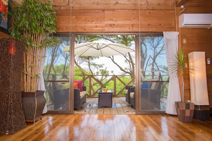 Log house in nature with dynamic ocean views @ OCEAN VIEW COPAIN - Image 1